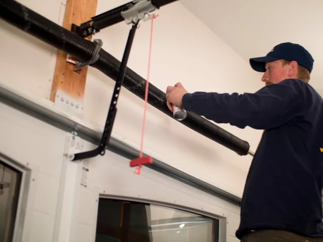 How much does it cost to remove and install a garage door?
